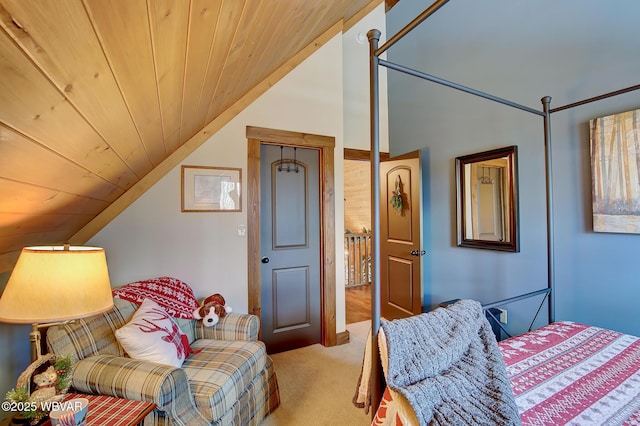 bedroom with carpet floors, wooden ceiling, and vaulted ceiling