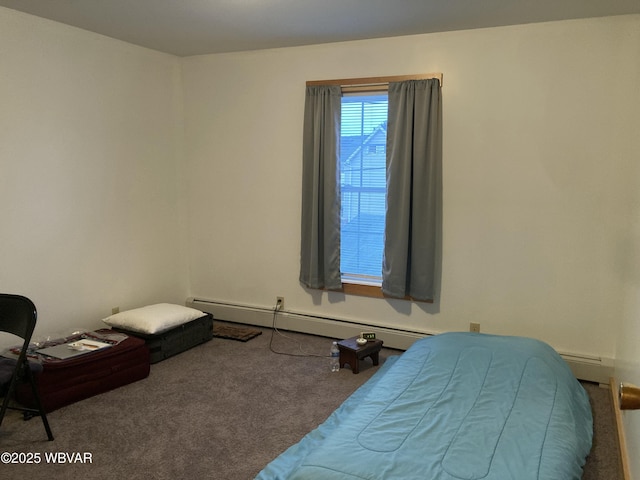 bedroom featuring baseboard heating and carpet floors