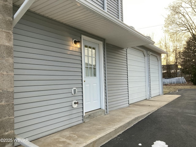 exterior space with a garage