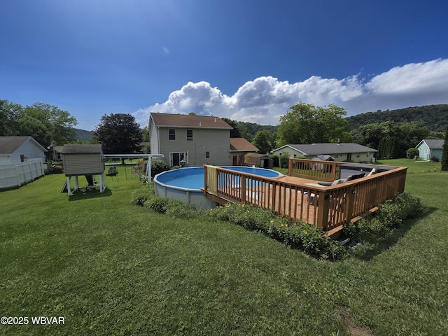 131 Walnut Ln, Jersey Shore, PA 17740 - back of property with a lawn and a wooden deck