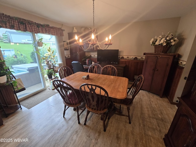 131 Walnut Ln, Jersey Shore, PA 17740 - dining area with a chandelier and light wood finished floors