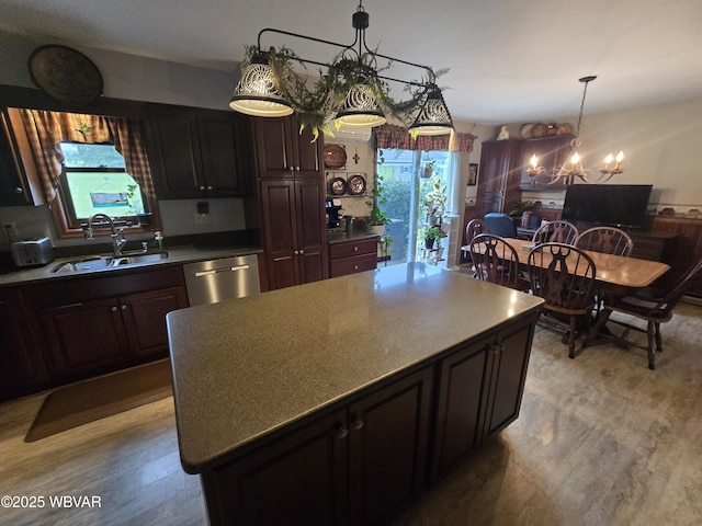 131 Walnut Ln, Jersey Shore, PA 17740 - kitchen with a chandelier, light wood finished floors, dishwasher, hanging light fixtures, and a kitchen island