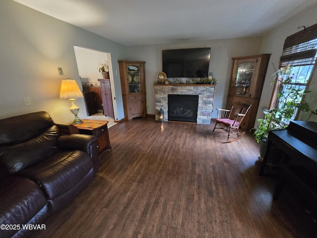 131 Walnut Ln, Jersey Shore, PA 17740 - living room with wood finished floors and a stone fireplace