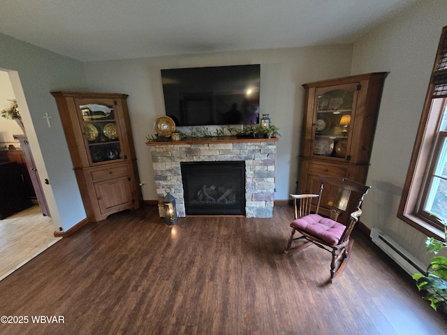 131 Walnut Ln, Jersey Shore, PA 17740 - living area with wood finished floors and a fireplace