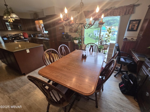 131 Walnut Ln, Jersey Shore, PA 17740 - dining area with a chandelier