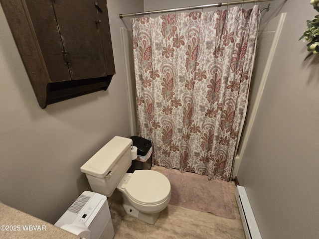 131 Walnut Ln, Jersey Shore, PA 17740 - bathroom with baseboard heating and shower / bath combo