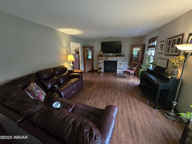 131 Walnut Ln, Jersey Shore, PA 17740 - living room with wood finished floors and a stone fireplace