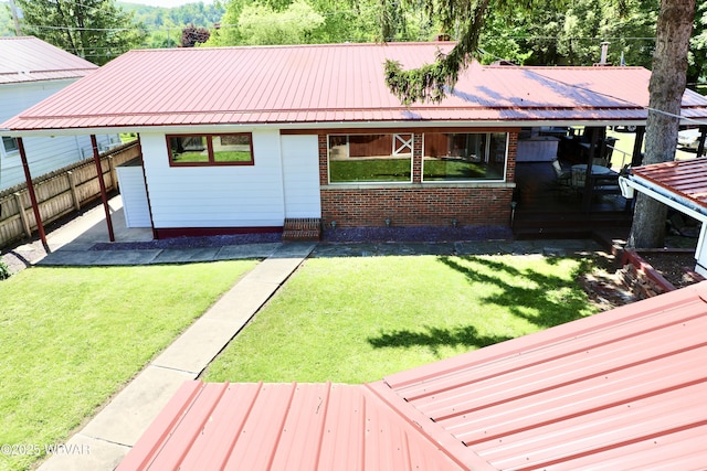 3630 Linn St, Cogan Station, PA 17728 - rear view of property featuring brick siding and metal roof