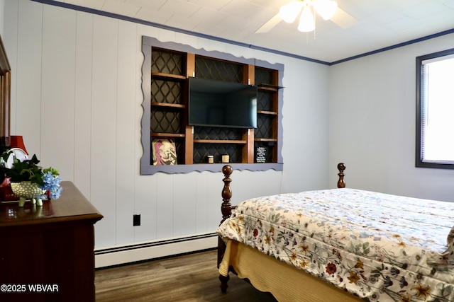 3630 Linn St, Cogan Station, PA 17728 - bedroom featuring baseboard heating, wood finished floors, and ornamental molding