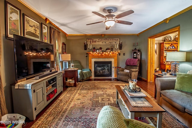 196 Shawnee Dr, Muncy, PA 17756 - living room with a fireplace with flush hearth, a ceiling fan, ornamental molding, and wood finished floors