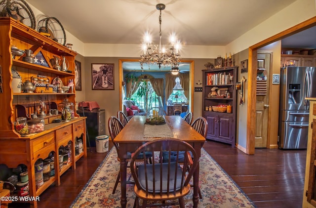 196 Shawnee Dr, Muncy, PA 17756 - dining room with a chandelier and dark wood-style flooring
