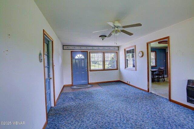 443 Derr Hill Rd, Lock Haven, PA 17745 - unfurnished room with baseboards, carpet flooring, a ceiling fan, and heating unit