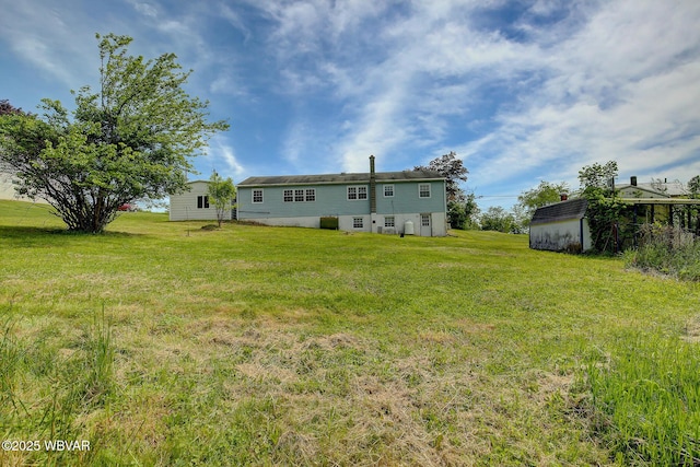443 Derr Hill Rd, Lock Haven, PA 17745 - rear view of property with a lawn and an outdoor structure