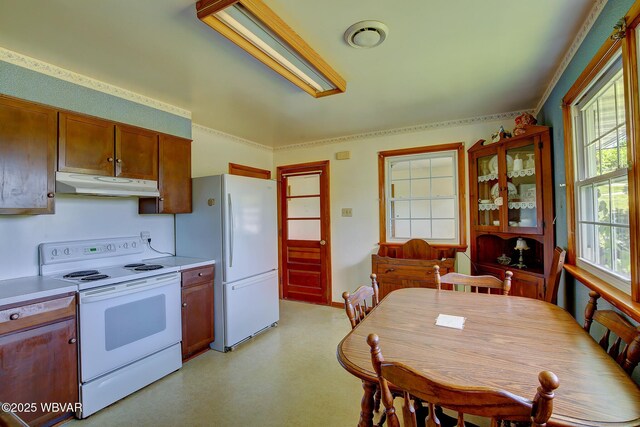 443 Derr Hill Rd, Lock Haven, PA 17745 - kitchen featuring white appliances, under cabinet range hood, light countertops, glass insert cabinets, and brown cabinets