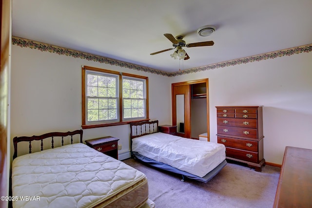 443 Derr Hill Rd, Lock Haven, PA 17745 - bedroom featuring a baseboard radiator, a closet, carpet floors, baseboards, and ceiling fan