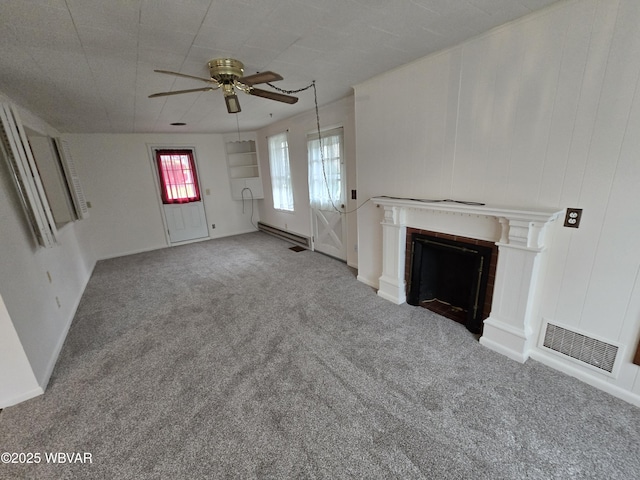 unfurnished living room featuring a baseboard radiator, a fireplace, carpet flooring, visible vents, and a ceiling fan