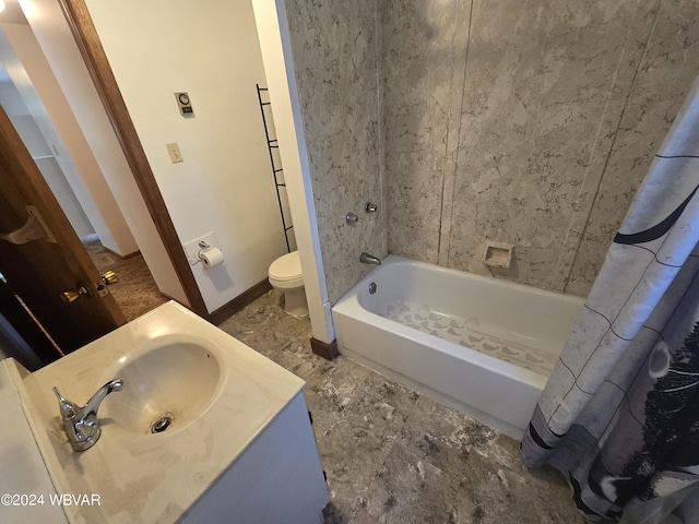 bathroom featuring vanity, shower / bath combination with curtain, toilet, and baseboards