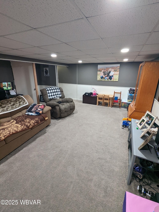 recreation room featuring a drop ceiling, carpet, and recessed lighting