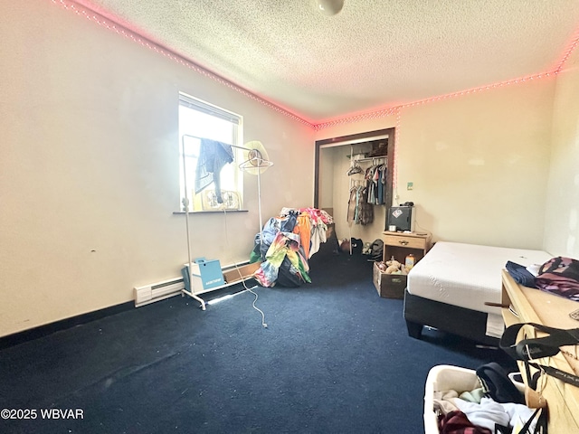 177 Haagen Ln, Beech Creek, PA 16822 - bedroom featuring a textured ceiling, a closet, and baseboard heating