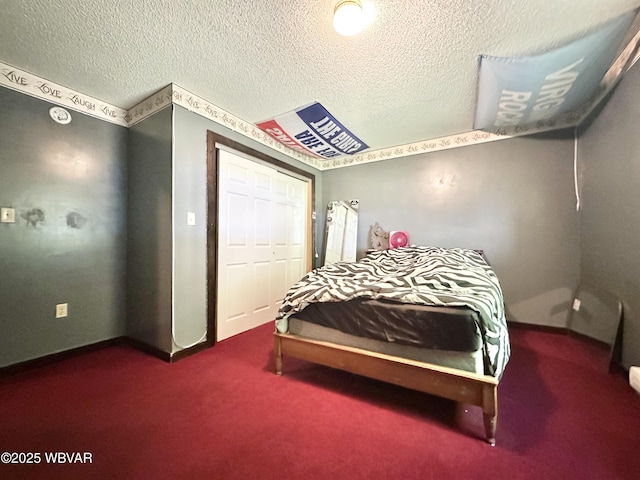 177 Haagen Ln, Beech Creek, PA 16822 - bedroom featuring carpet, a closet, a textured ceiling, and baseboards