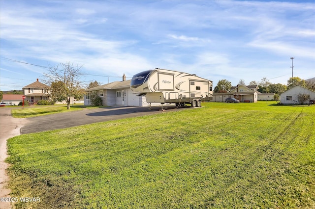 exterior space with a front lawn