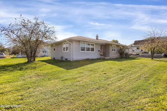 single story home featuring a front lawn