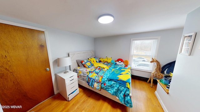 599 E Academy St, Hughesville, PA 17737 - bedroom with light wood-style floors and baseboards