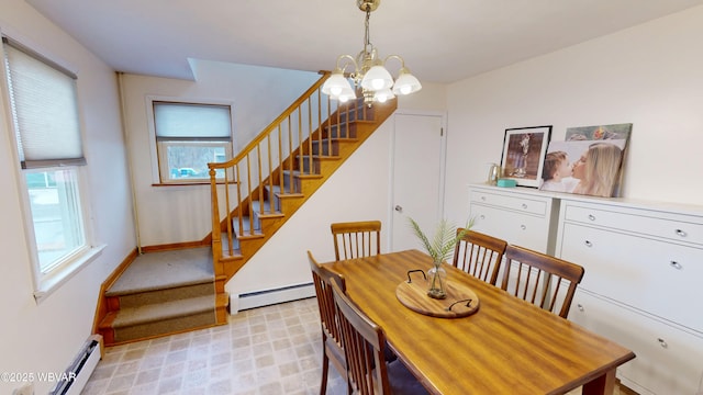 599 E Academy St, Hughesville, PA 17737 - dining room featuring an inviting chandelier, a baseboard radiator, stairs, and baseboards