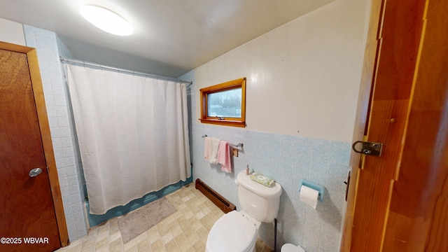 599 E Academy St, Hughesville, PA 17737 - full bathroom featuring toilet, a shower with curtain, tile walls, and a wainscoted wall