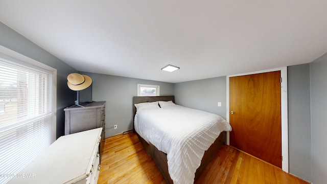 599 E Academy St, Hughesville, PA 17737 - bedroom with light wood-style flooring and multiple windows