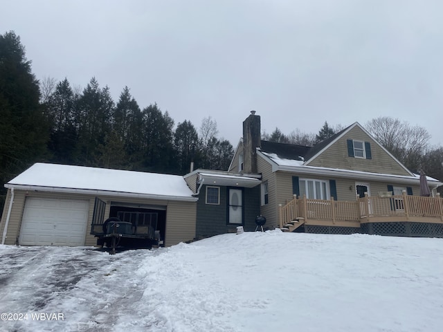 view of front facade featuring a garage and a deck