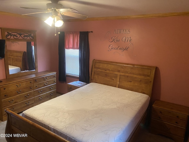 bedroom with ceiling fan and ornamental molding