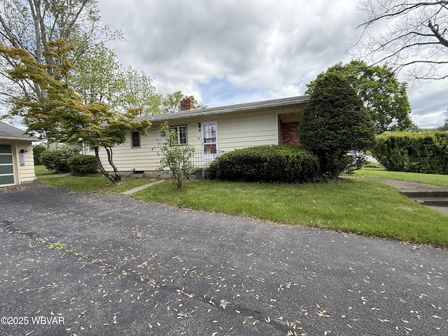 1714 Princeton Ave, Williamsport, PA 17701 - view of front facade with a chimney and a front lawn