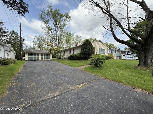 1714 Princeton Ave, Williamsport, PA 17701 - view of front facade featuring a front yard and a garage