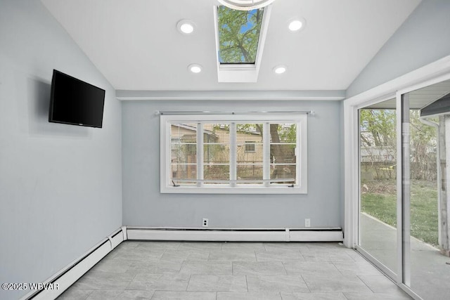 spare room with a baseboard heating unit, lofted ceiling, and recessed lighting