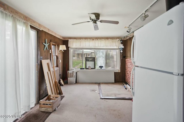 interior space featuring track lighting