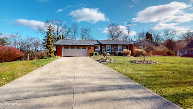 ranch-style home featuring a front yard and a garage