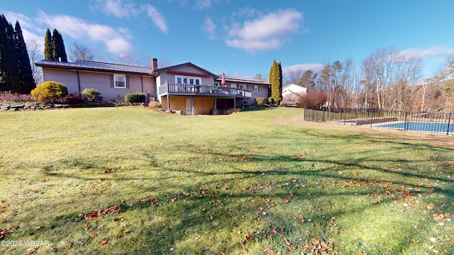 view of yard featuring a swimming pool side deck