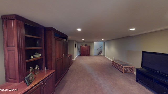 interior space featuring light colored carpet