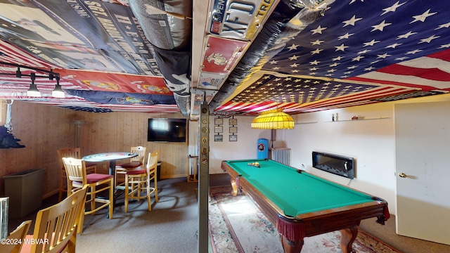 playroom with carpet flooring, wooden walls, and pool table