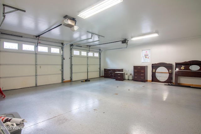 garage featuring a garage door opener