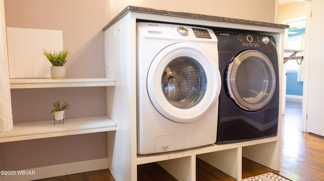 1945 Eagle Valley Rd, Beech Creek, PA 16822 - laundry area with wood finished floors and washing machine and dryer
