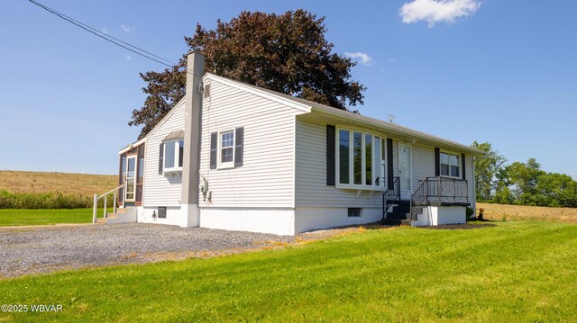 1945 Eagle Valley Rd, Beech Creek, PA 16822 - view of front of home with a chimney, a front lawn, and entry steps