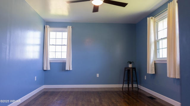 1945 Eagle Valley Rd, Beech Creek, PA 16822 - empty room with a ceiling fan and dark wood-style floors