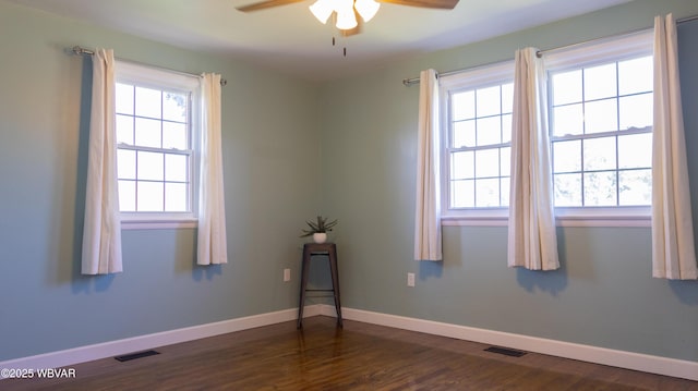 1945 Eagle Valley Rd, Beech Creek, PA 16822 - spare room featuring a ceiling fan and dark wood-style flooring