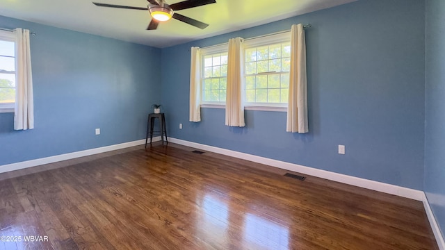 1945 Eagle Valley Rd, Beech Creek, PA 16822 - empty room with wood finished floors, ceiling fan, and plenty of natural light