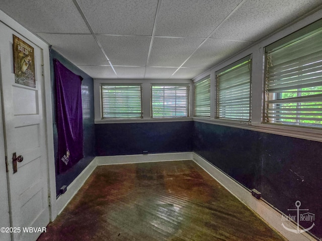 345 W Main St, Lock Haven, PA 17745 - empty room with a paneled ceiling and baseboards