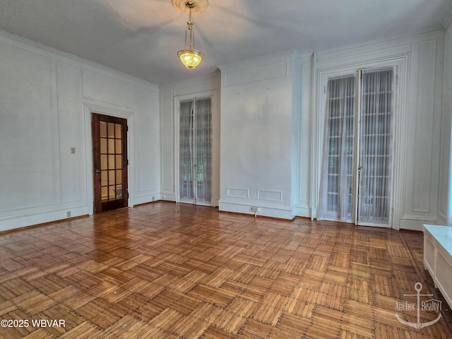 345 W Main St, Lock Haven, PA 17745 - spare room featuring a decorative wall and ornamental molding