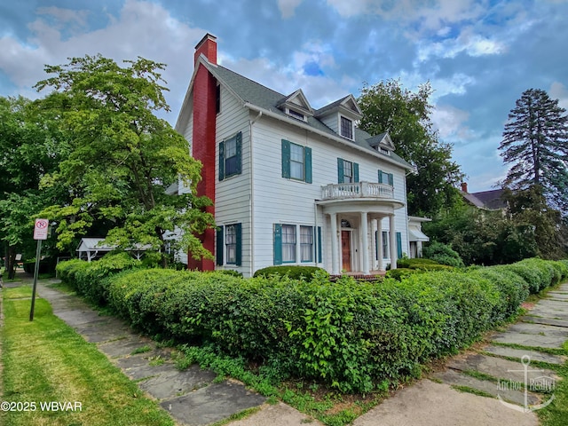 345 W Main St, Lock Haven, PA 17745 - view of front of property featuring a balcony and a chimney