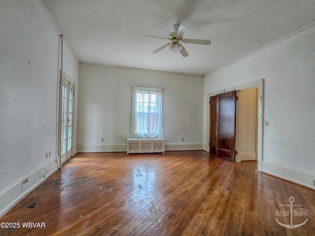 345 W Main St, Lock Haven, PA 17745 - empty room featuring radiator heating unit, ornamental molding, ceiling fan, and wood finished floors